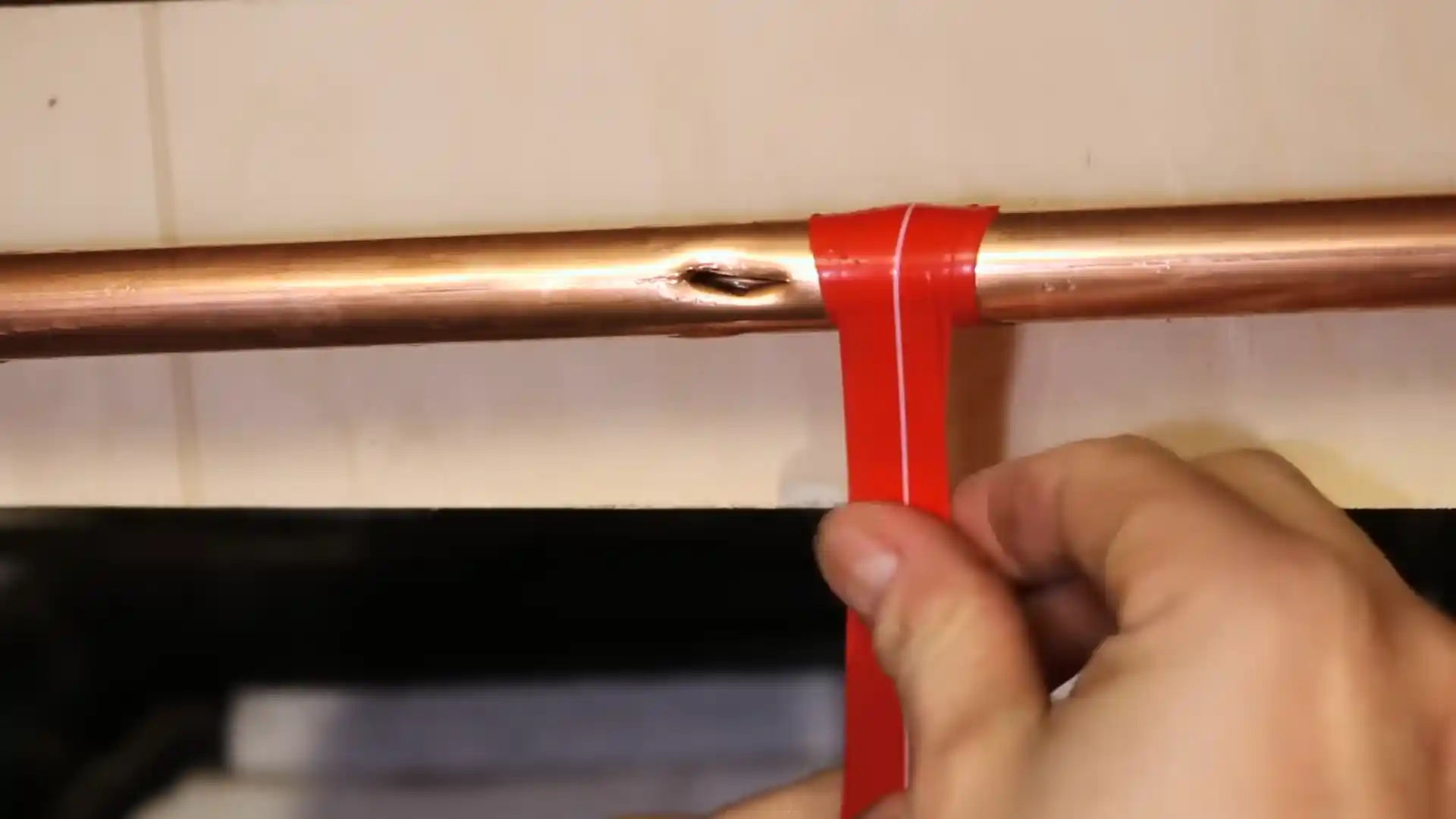 Water pressure gauge connected to Loveland Colorado home supply line showing PSI reading